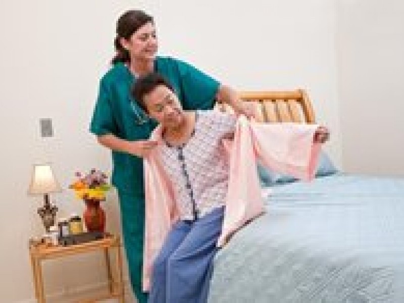 Home Care orange county, orange county home care, helping elderly getting dressed
